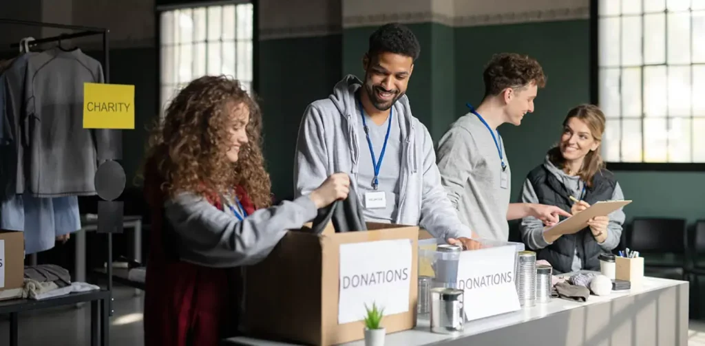 Donation box with staff attendants