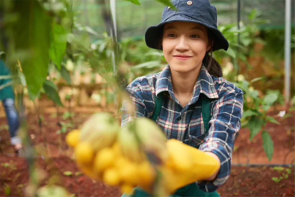 9 Food and Restaurant Tech to Watch Out for in 2023- woman harvesting crops