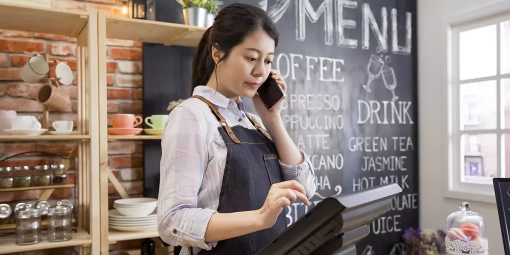 Woman Using POS