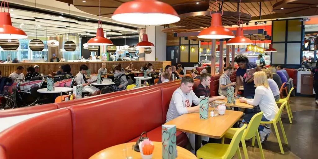 crowded fast-food restaurant in a Dubai airport