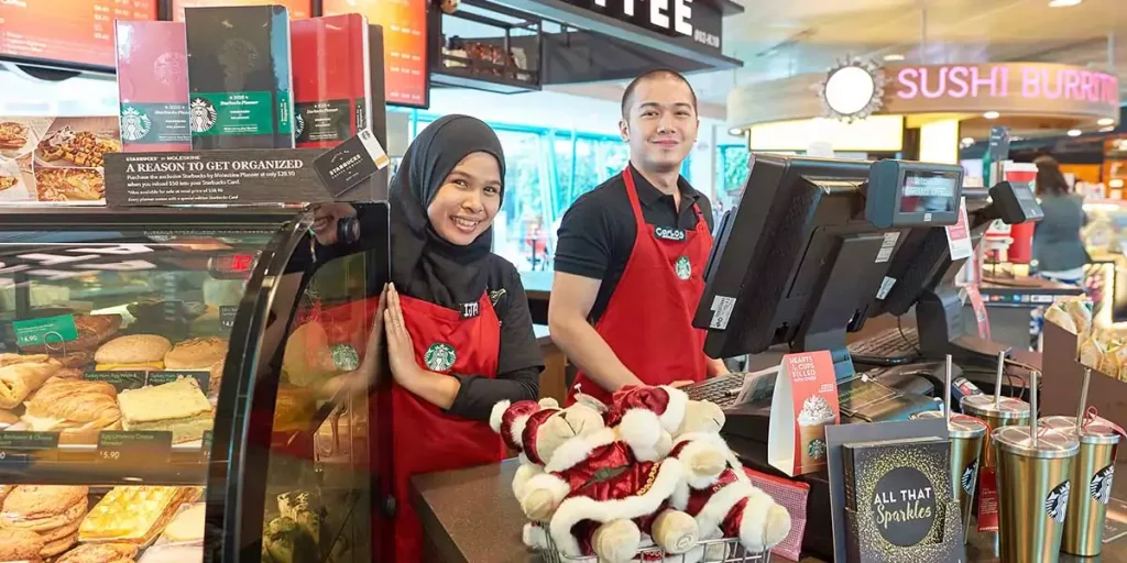 Starbucks baristas smiling