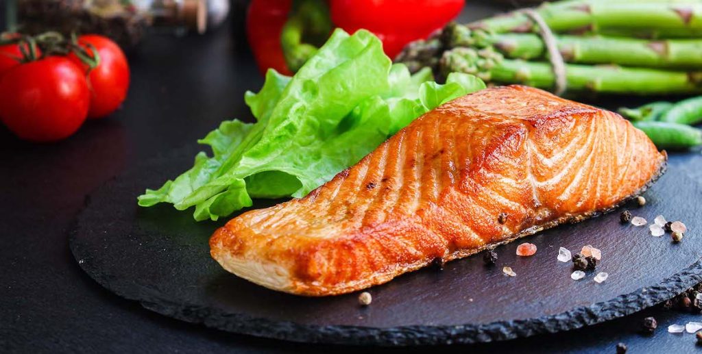 Should Your Restaurant Follow Diet Trends? - a slice of salmon on a plate